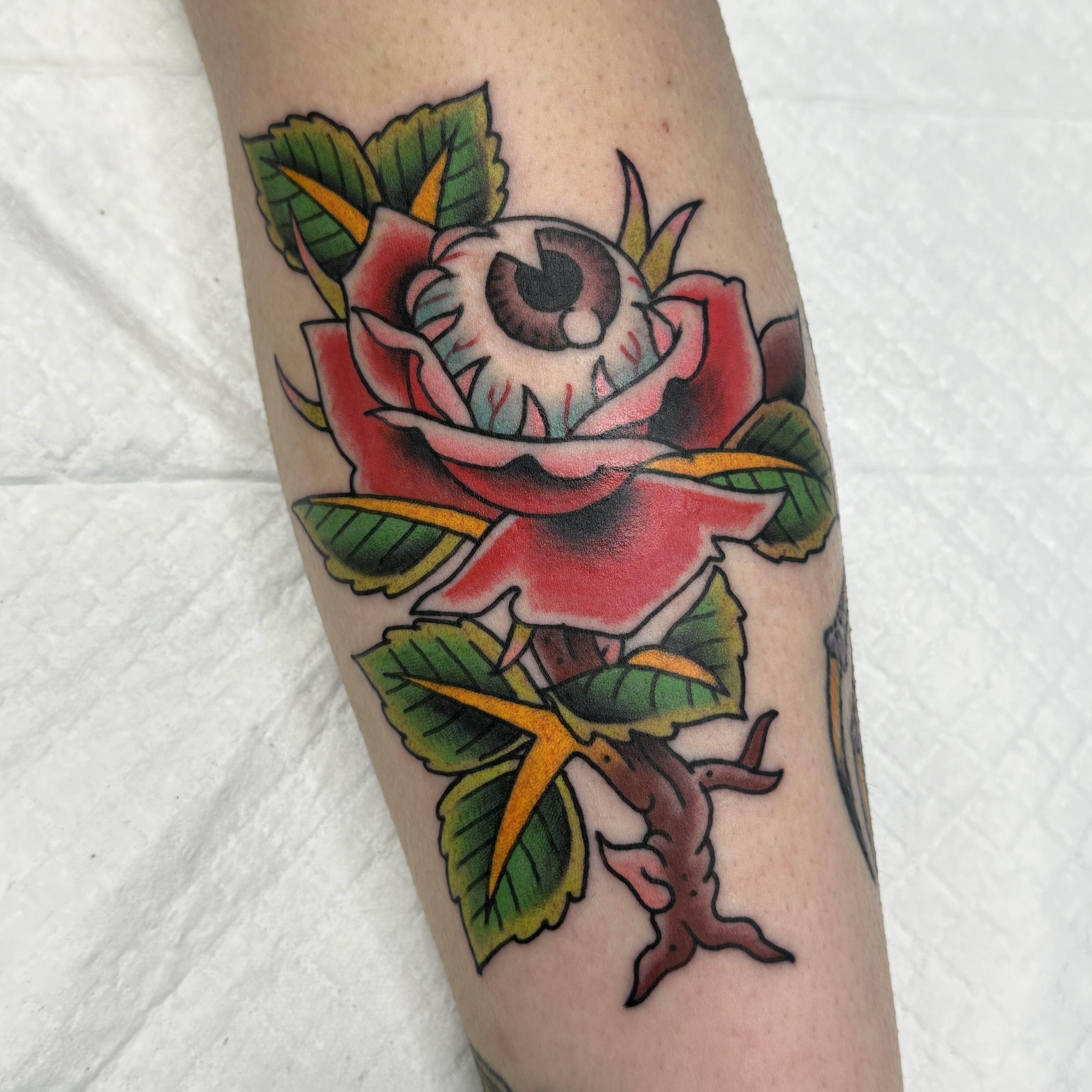 eyeball rose tattoo, trad flash, trad ink, sherwood park tattoos, champion tattoo, handmade tattoos