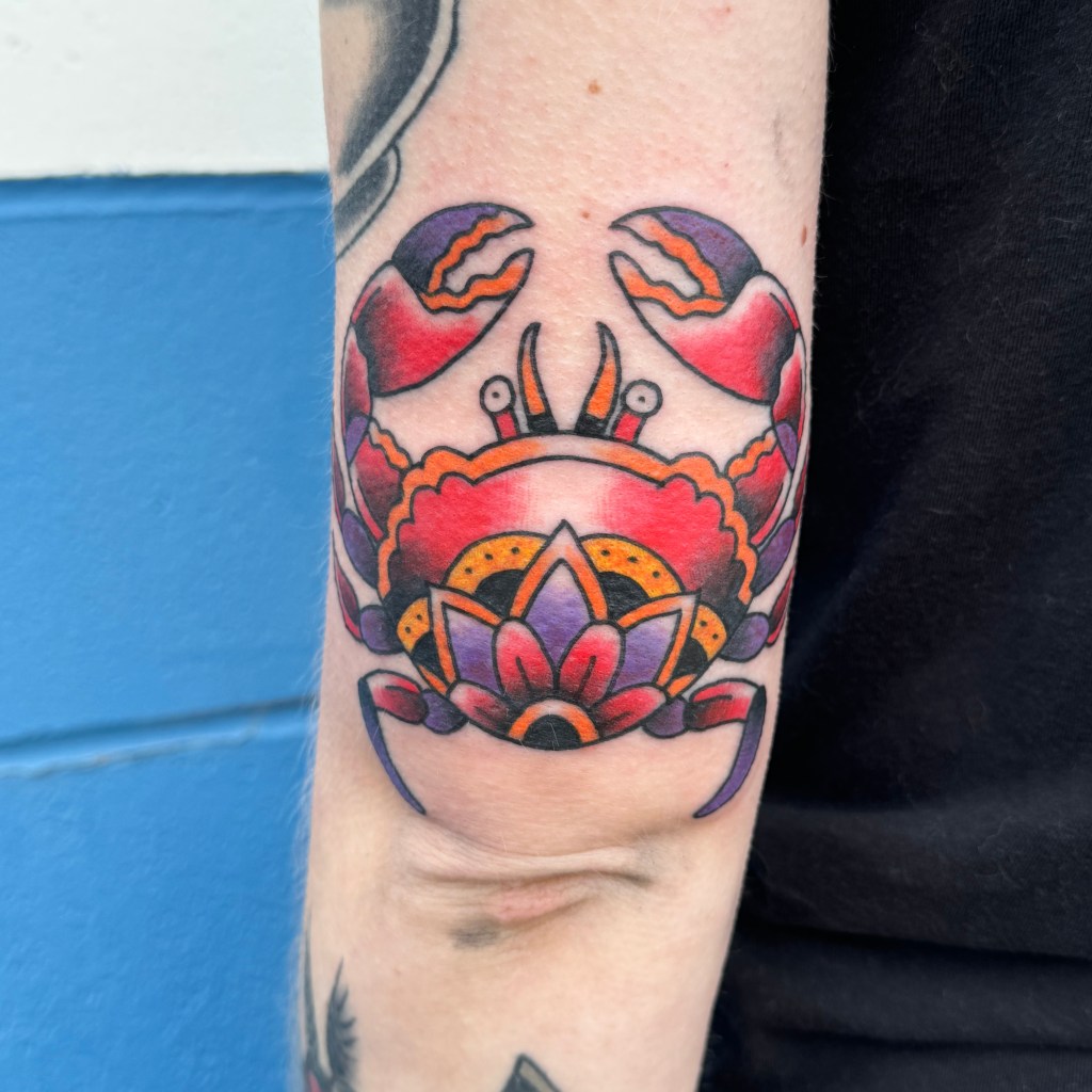 crab tattoo, cancer astrology tattoo